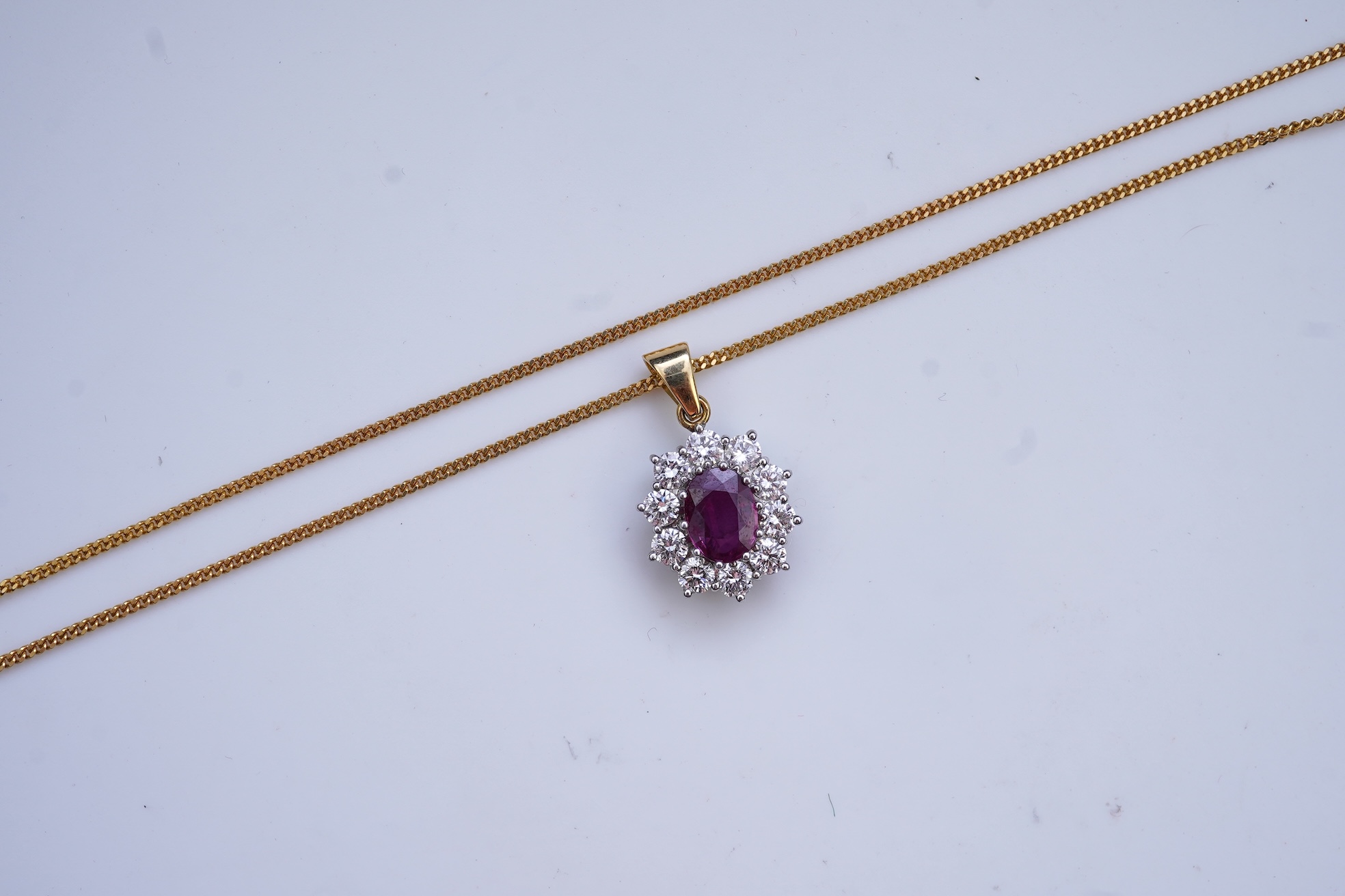 A ruby and diamond pendant